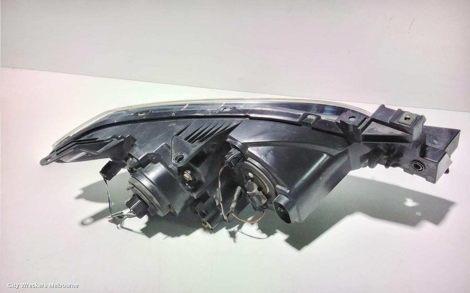 MAZDA 3 LEFT HEADLAMP, BK, SEDAN, NON HID, MANUAL ADJUST TYPE, 10/2003 - 04/2009