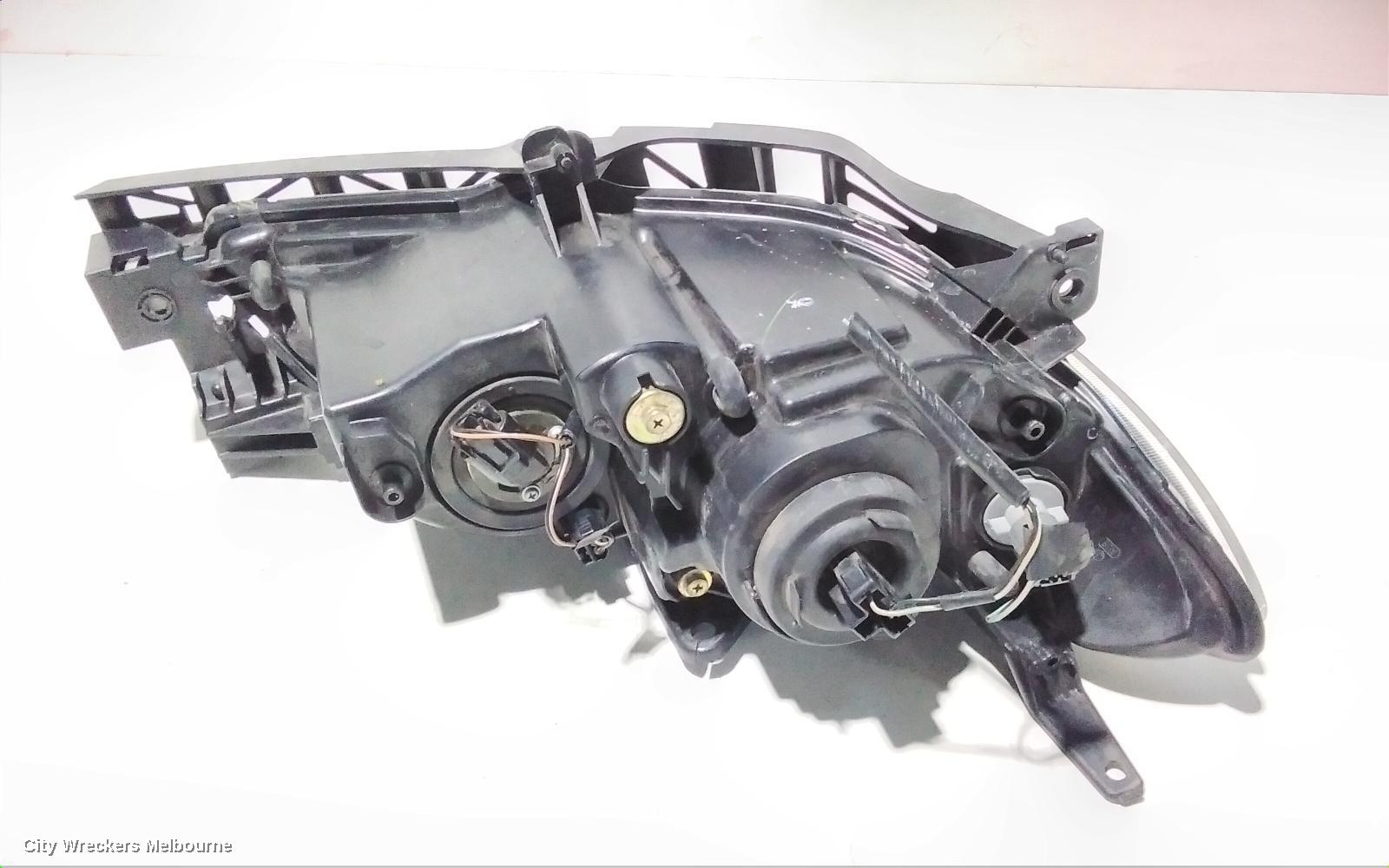 MAZDA 3 LEFT HEADLAMP, BK, SEDAN, NON HID, MANUAL ADJUST TYPE, 10/2003 - 04/2009