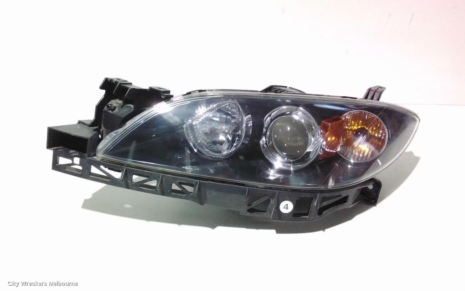 MAZDA 3 LEFT HEADLAMP, BK, SEDAN, NON HID, MANUAL ADJUST TYPE, 10/2003 - 04/2009