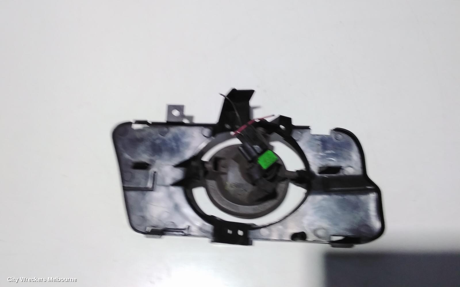 MAZDA 3 LEFT INDICATOR/FOG/SIDE, BUMPER FOGLAMP, BK, ROUND TYPE, LENS# 114-61009, 10/2003 - 04/2009