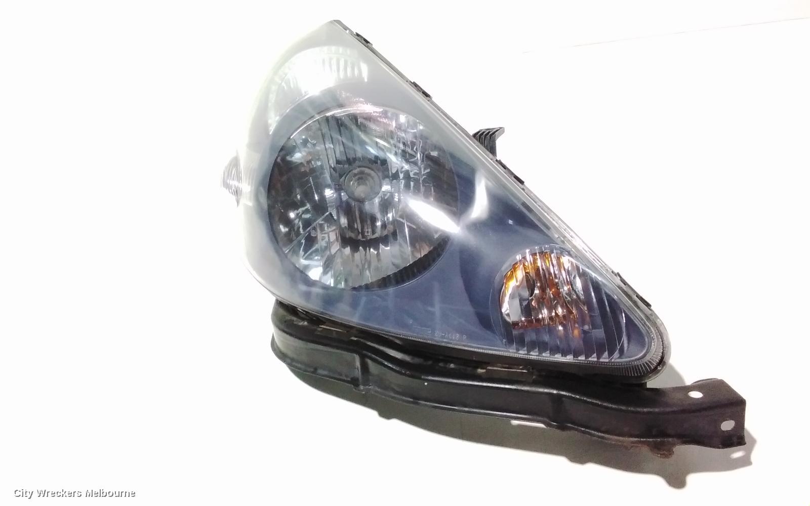 HONDA JAZZ RIGHT HEADLAMP, GD, 1.5 ENG, BLACK INNER, CHROME INSERT TYPE, MANUAL ADJ, LENS# 4944, 10/2004 - 09/2008