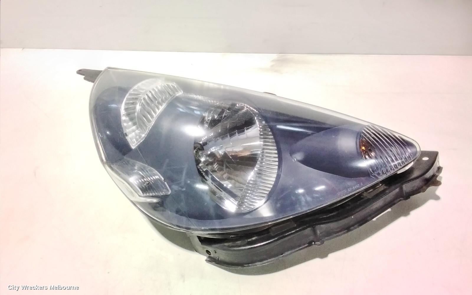 HONDA JAZZ RIGHT HEADLAMP, GD, 1.5 ENG, BLACK INNER, CHROME INSERT TYPE, MANUAL ADJ, LENS# 4944, 10/2004 - 09/2008