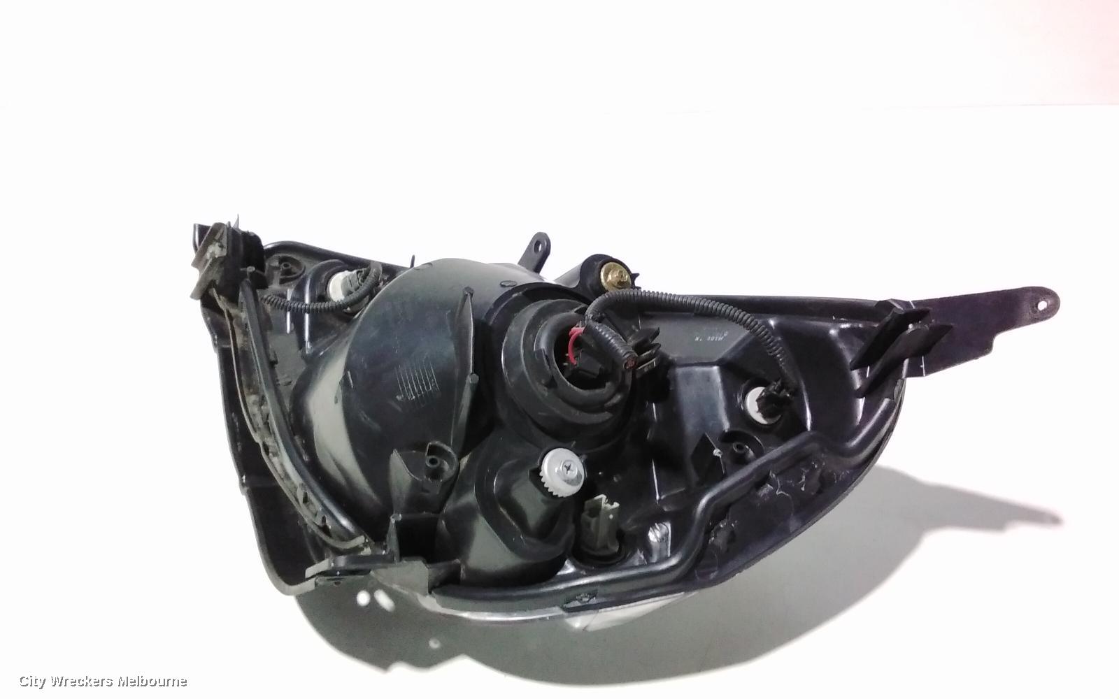 HONDA JAZZ RIGHT HEADLAMP, GD, 1.5 ENG, BLACK INNER, CHROME INSERT TYPE, MANUAL ADJ, LENS# 4944, 10/2004 - 09/2008