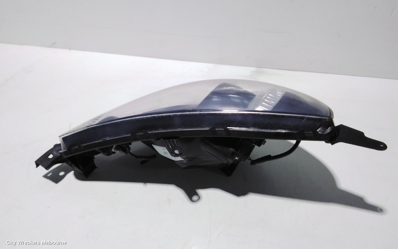 HONDA JAZZ RIGHT HEADLAMP, GD, 1.5 ENG, BLACK INNER, CHROME INSERT TYPE, MANUAL ADJ, LENS# 4944, 10/2004 - 09/2008