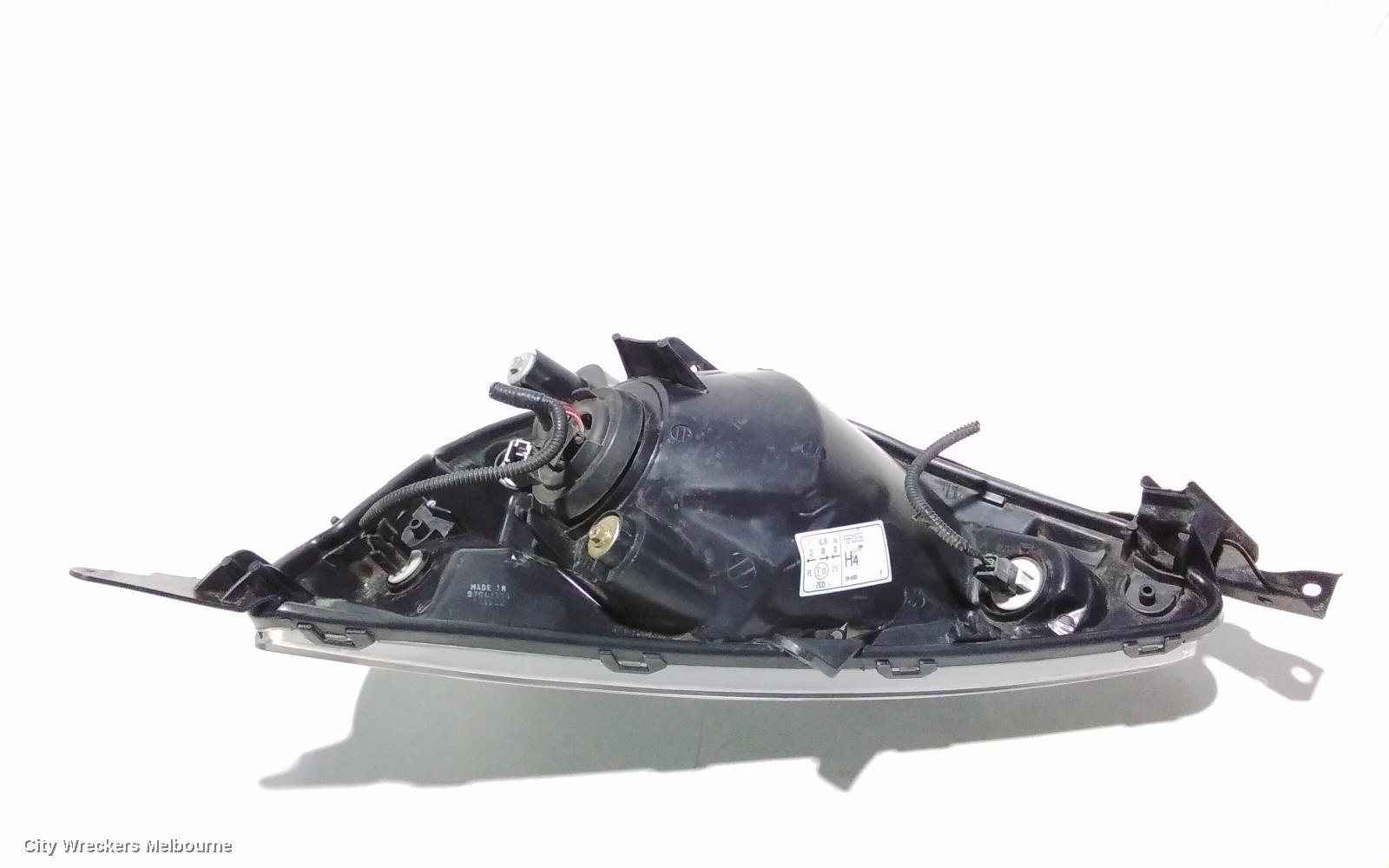 HONDA JAZZ RIGHT HEADLAMP, GD, 1.5 ENG, BLACK INNER, CHROME INSERT TYPE, MANUAL ADJ, LENS# 4944, 10/2004 - 09/2008