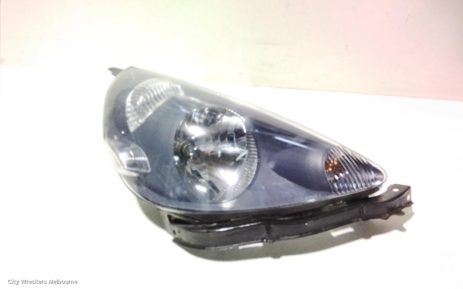 HONDA JAZZ RIGHT HEADLAMP, GD, 1.5 ENG, BLACK INNER, CHROME INSERT TYPE, MANUAL ADJ, LENS# 4944, 10/2004 - 09/2008