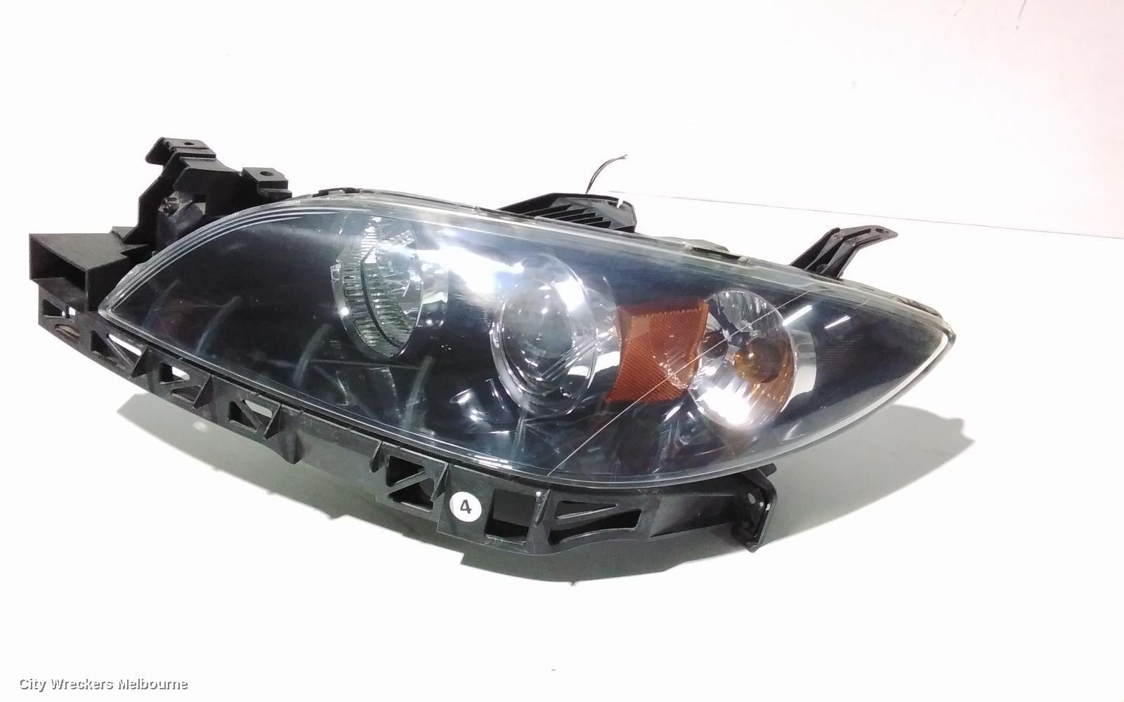 MAZDA 3 LEFT HEADLAMP, BK, SEDAN, NON HID, MANUAL ADJUST TYPE, 10/2003 - 04/2009